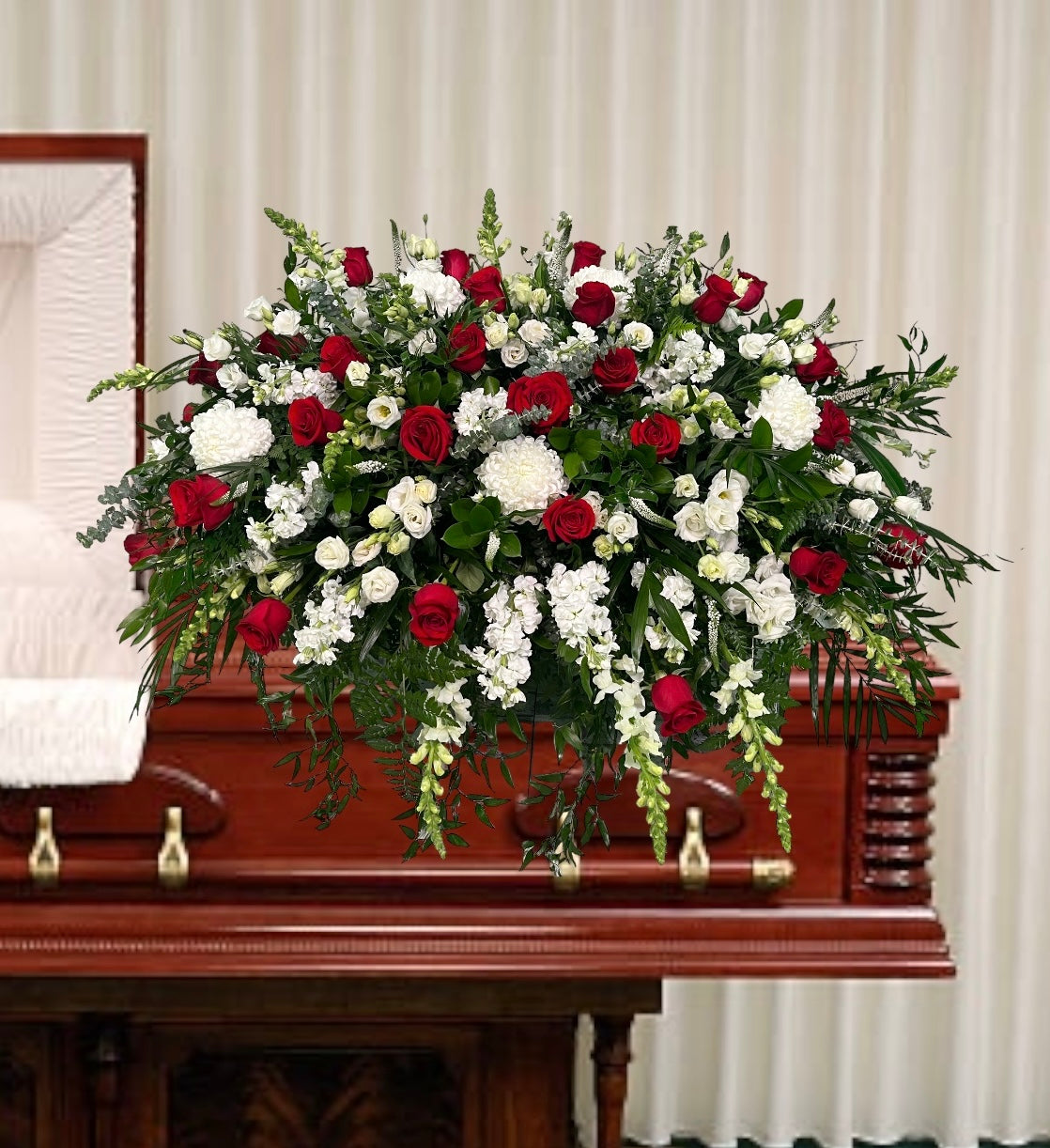 Elegant Blooms of Comfort Casket Spray