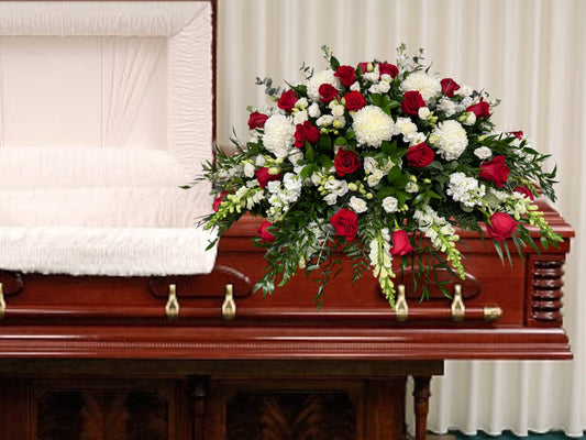 Elegant Blooms of Comfort Casket Spray